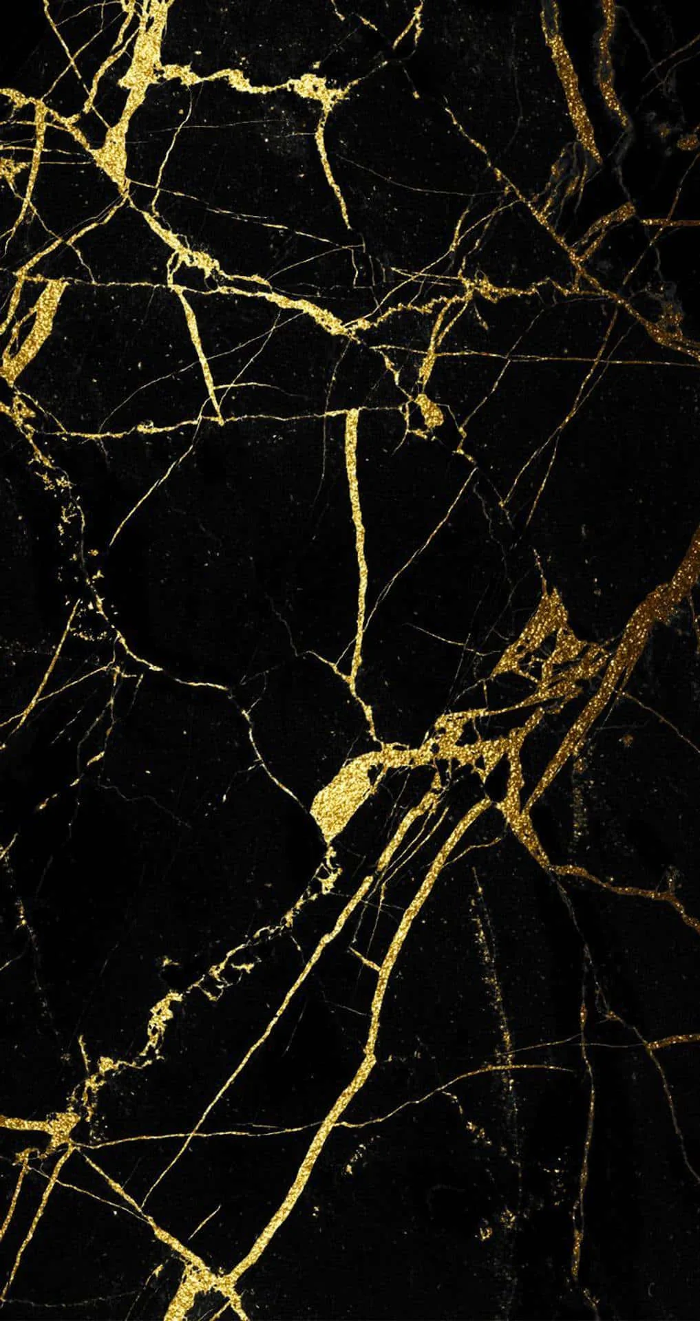 Thin veins crawl the full height of this portrait slab, the brightest fork crossing mid-frame, while the stretch just left of centre stays darkest.