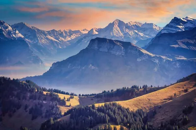 Layered Alpine Ridges at Dusk HD Wallpaper