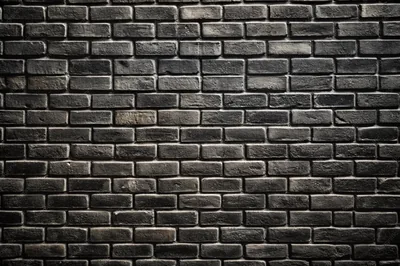 Black brick wall texture as background or wallpaper for inserting text