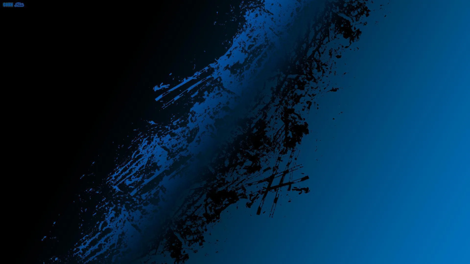 A smooth blue gradient runs across the frame, split by a diagonal band of eroded black flecks that scatter toward the top left.