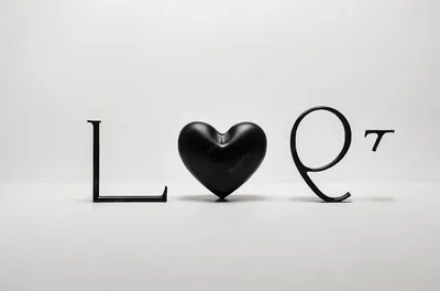 A black heart with a white background that says quot love quot