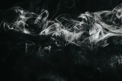 White smoke against black background Free Stock Photo