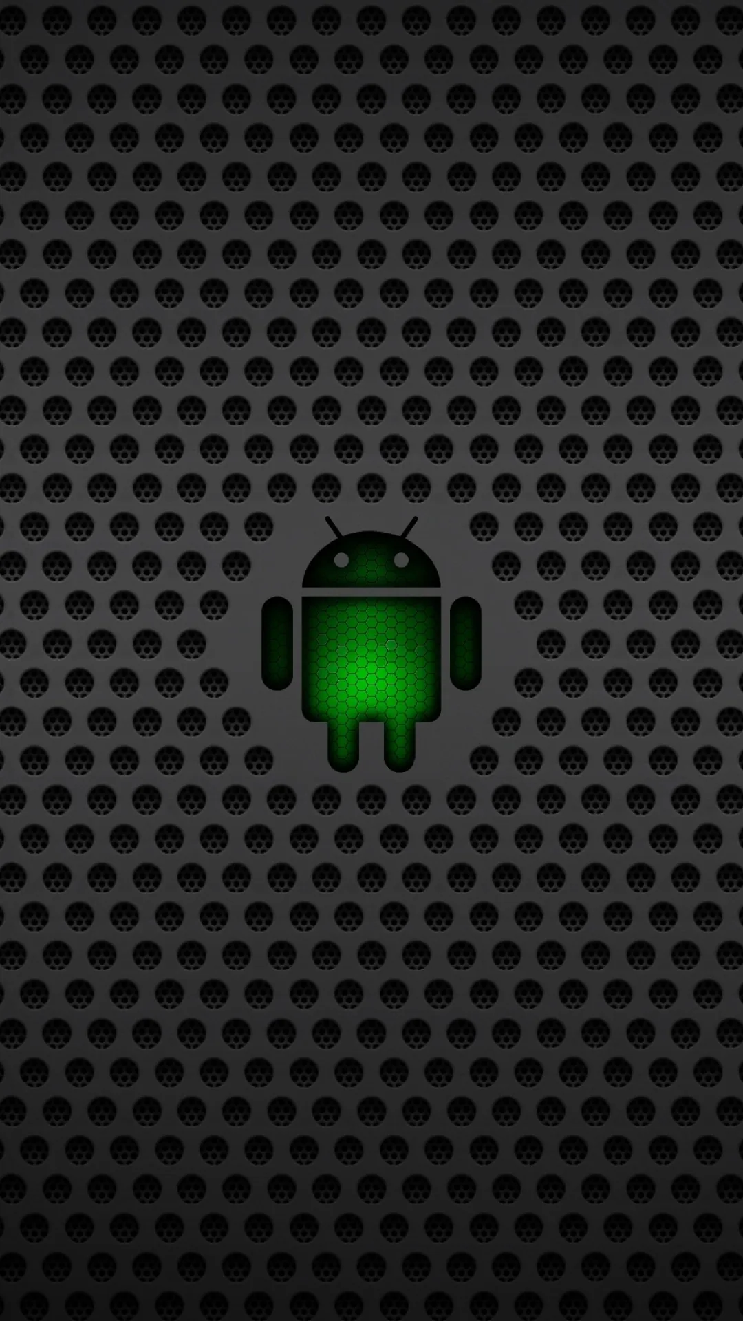 The green Android robot stands small at the centre of a dark perforated steel sheet, the holes rendered in relief and dimming toward the frame.
