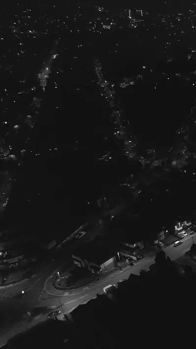Night Aerial View of City Streets Illuminated