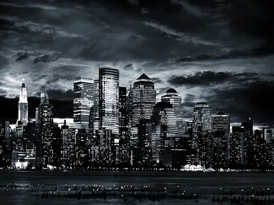 Night Skyline Under Heavy Clouds HD Wallpaper
