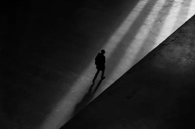 Walking Through Shafts of Light HD Wallpaper