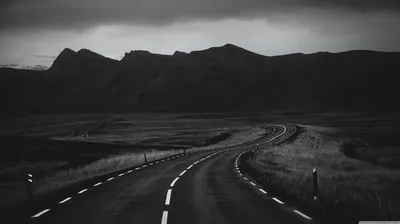 Empty Road Toward Dark Hills HD Wallpaper