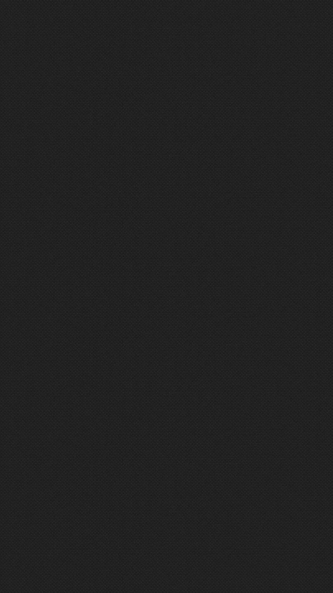 A tall phone-shaped frame of flat off-black with the faintest warm cast, no pattern or gradient to compete with the lock screen clock.
