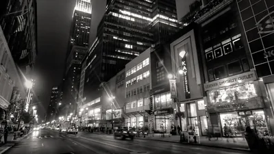 Black And White Picture Of Road Between Lighting Buildings HD Black Aesthetic Wallpapers