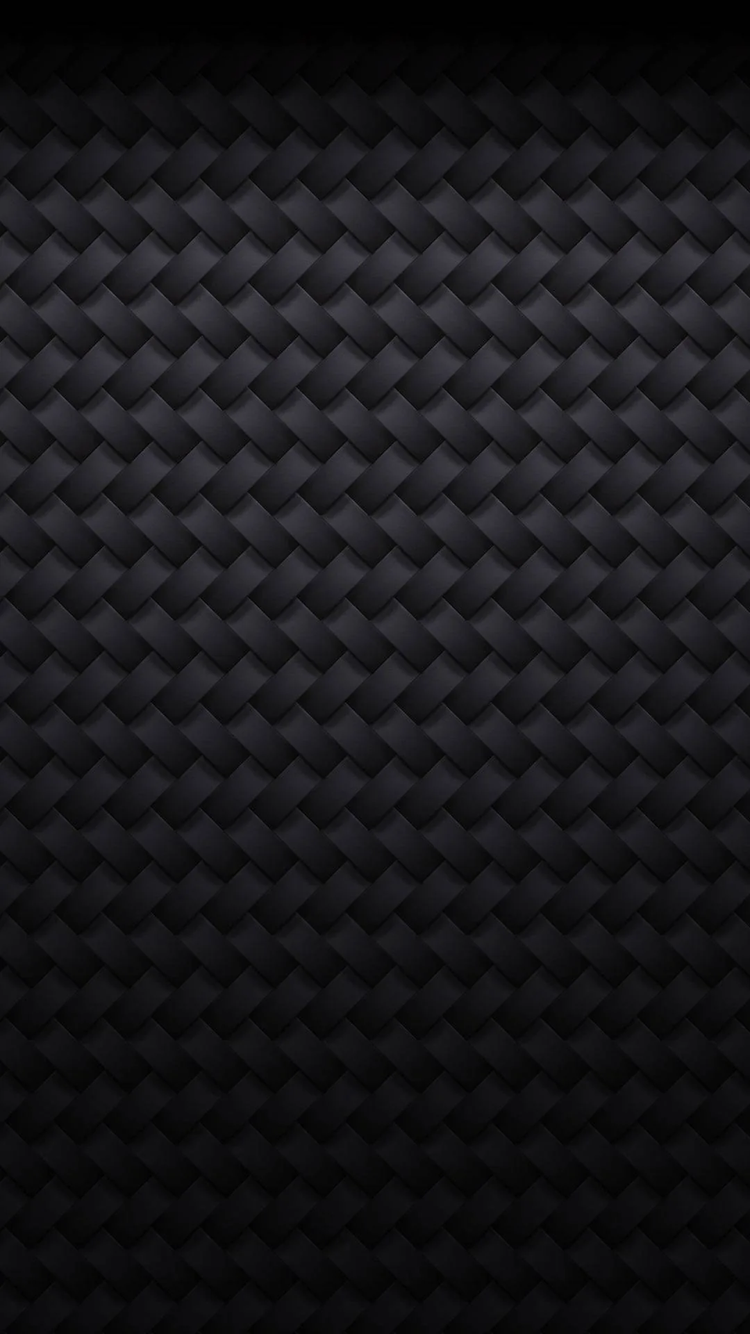 A tight basket weave of small charcoal squares repeats across the frame, each tile catching a slightly different angle of light.