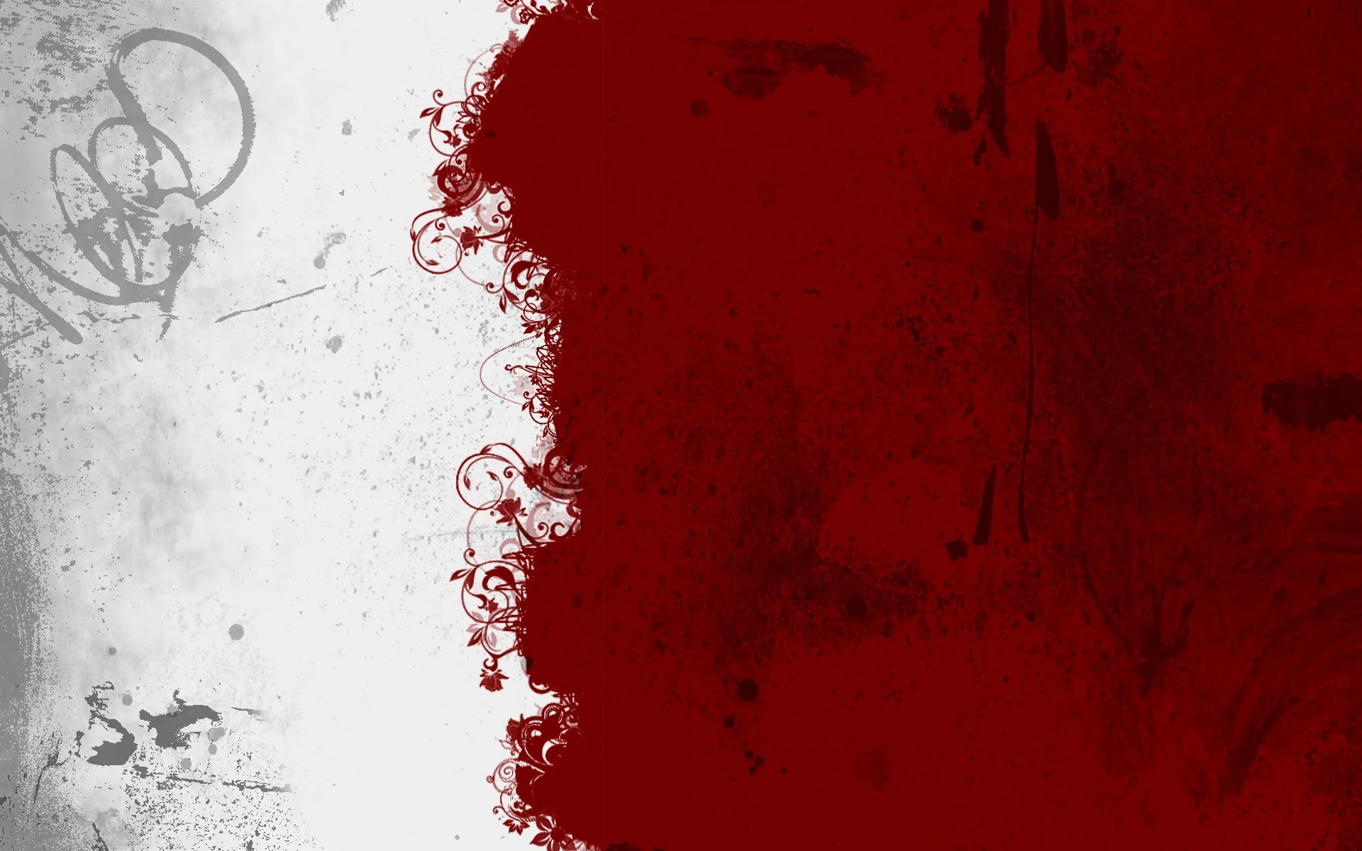 Dark red bleeds across the right two thirds of a pale concrete wall, the boundary breaking into fine curling tendrils.