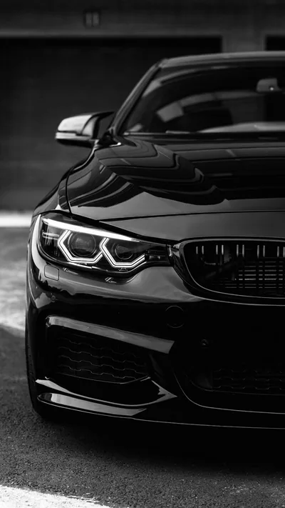 Black BMW Front End in a Parking Garage HD Phone Wallpaper