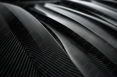 Black carbon fiber background with subtle light effects high resolution