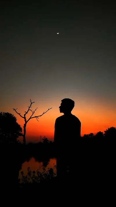 Profile Silhouette at Orange Sunset HD Phone Wallpaper