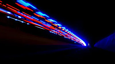 Speeding Light Trails in a Tunnel HD Wallpaper