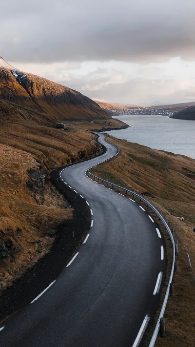 Winding Road Along a Fjord HD Phone Wallpaper