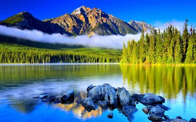 Pyramid Peak Above a Bright Blue Lake HD Wallpaper