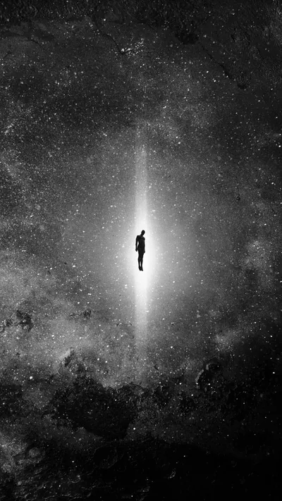 Lone Figure Standing in a Light Beam HD Phone Wallpaper