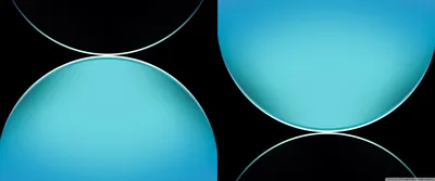 Cyan Circles Split Across Black Panels HD Wallpaper