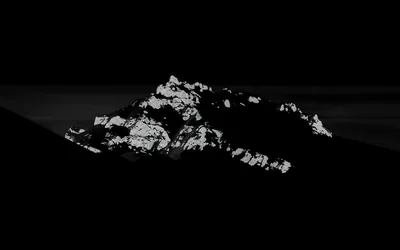 Rocky Peak Lit Out of the Dark HD Wallpaper