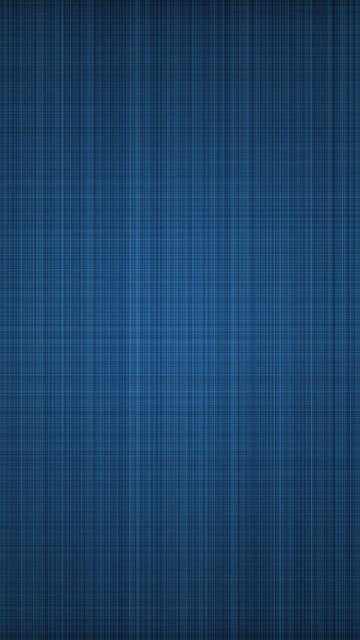 An even crosshatch of denim-blue threads covers the whole frame with no focal point, so icons and widgets sit cleanly anywhere on screen.