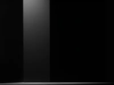 Lit Grey Column in a Dark Studio HD Wallpaper