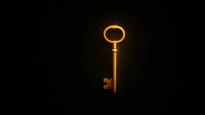 Glowing Gold Key on Black HD Wallpaper