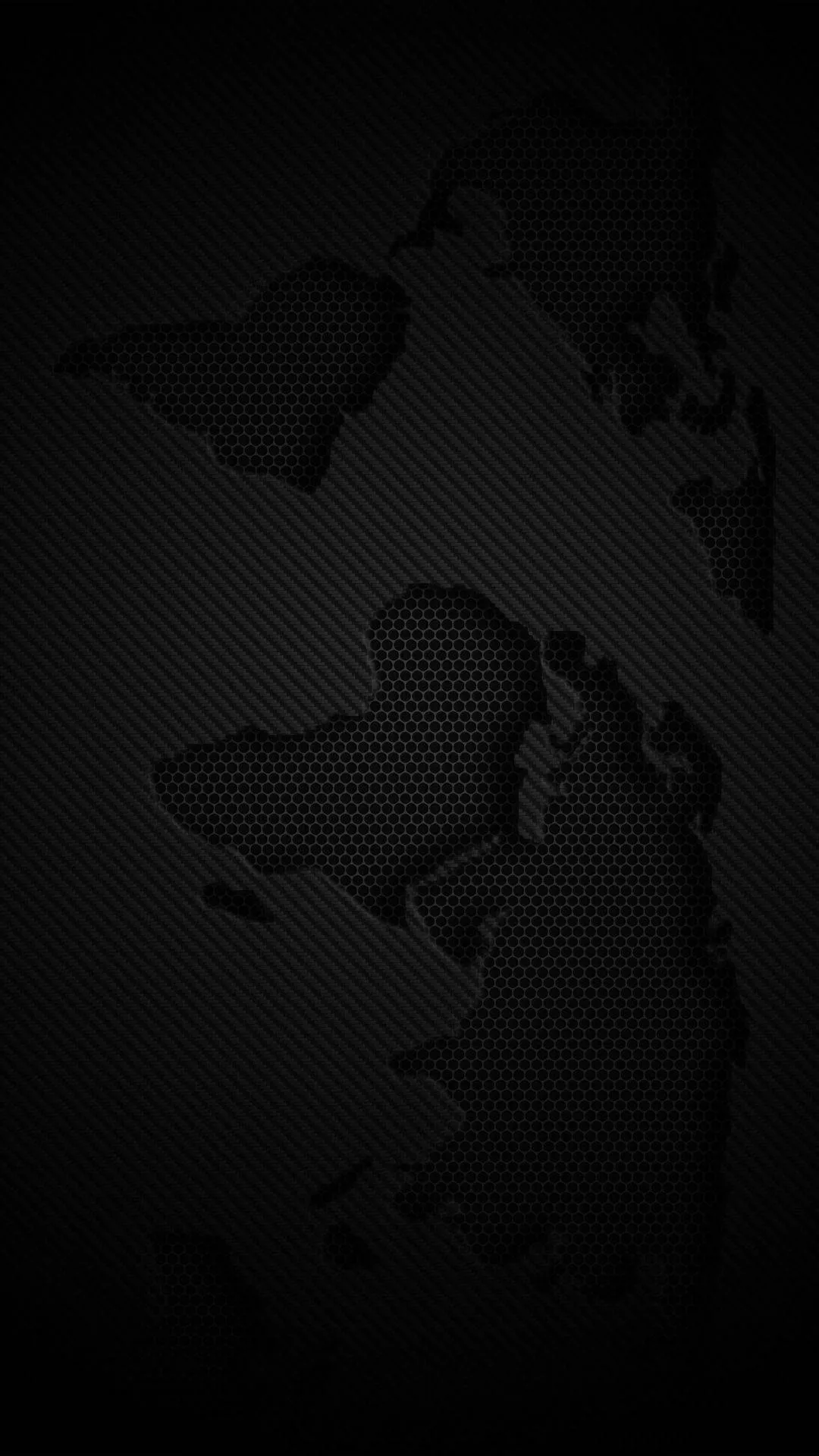 The continents cut out of a dotted carbon surface in a tall phone frame, the landmasses sitting a shade darker than the ground behind them.