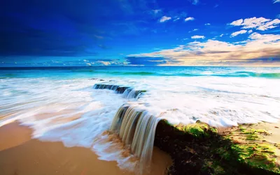 Wave Spilling Over a Beach Rock Ledge HD Wallpaper