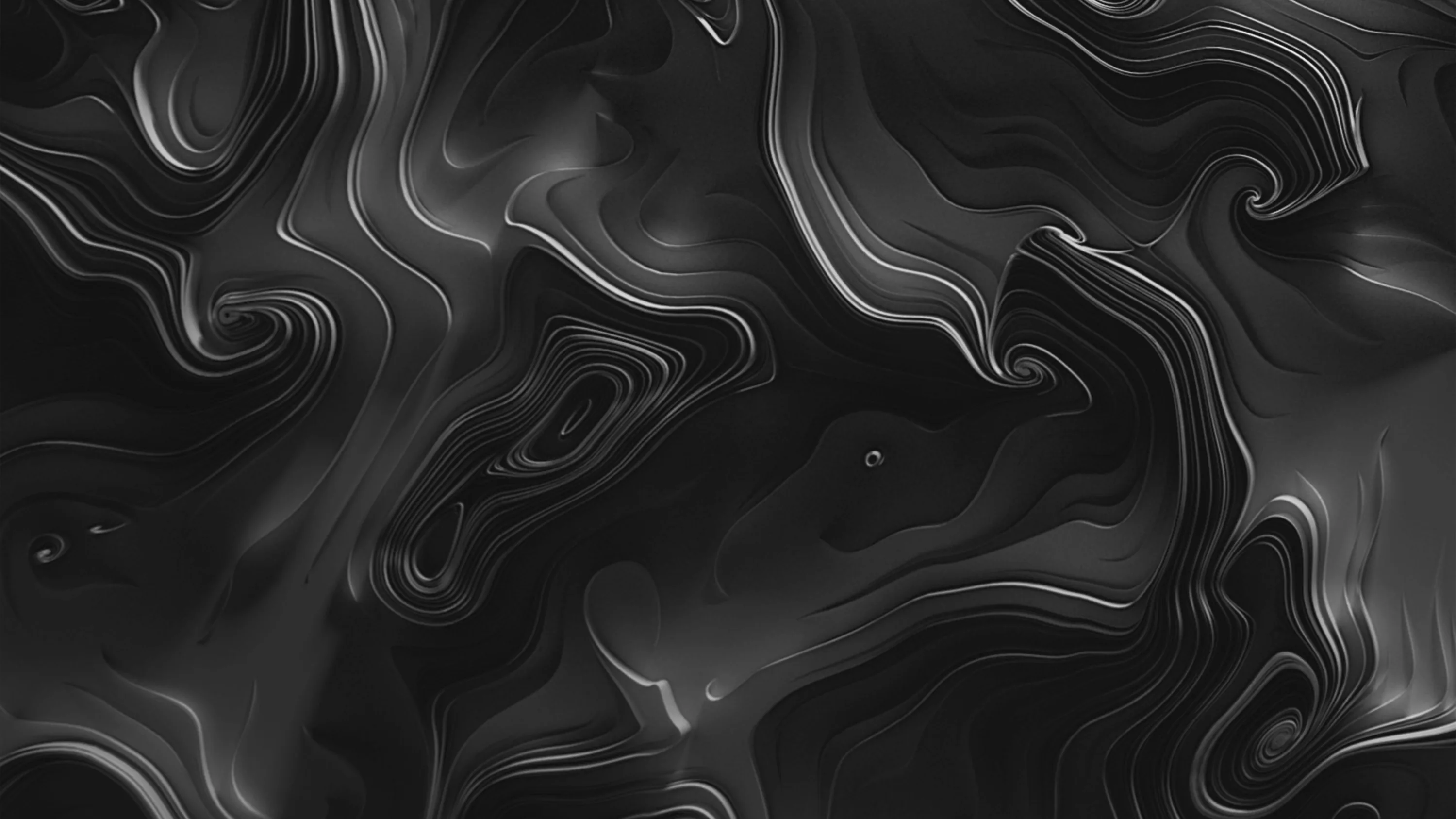 Glossy black flows into itself in soft swirls, thin silver veins tracing where the surface folds over.