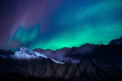 Northern Lights over Dark Peaks HD Wallpaper