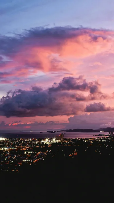 Purple Sunset over City Lights HD Phone Wallpaper