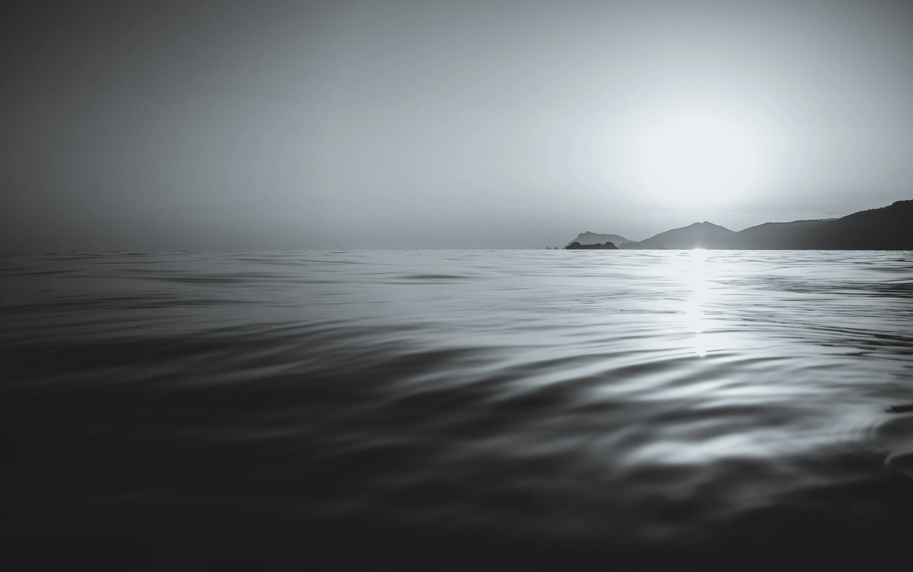 Black And White Calm Coast Islands Sea Sunset Waves 4k