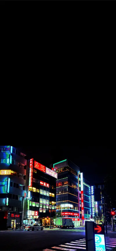 Neon Signs on a City Street at Night HD Phone Wallpaper