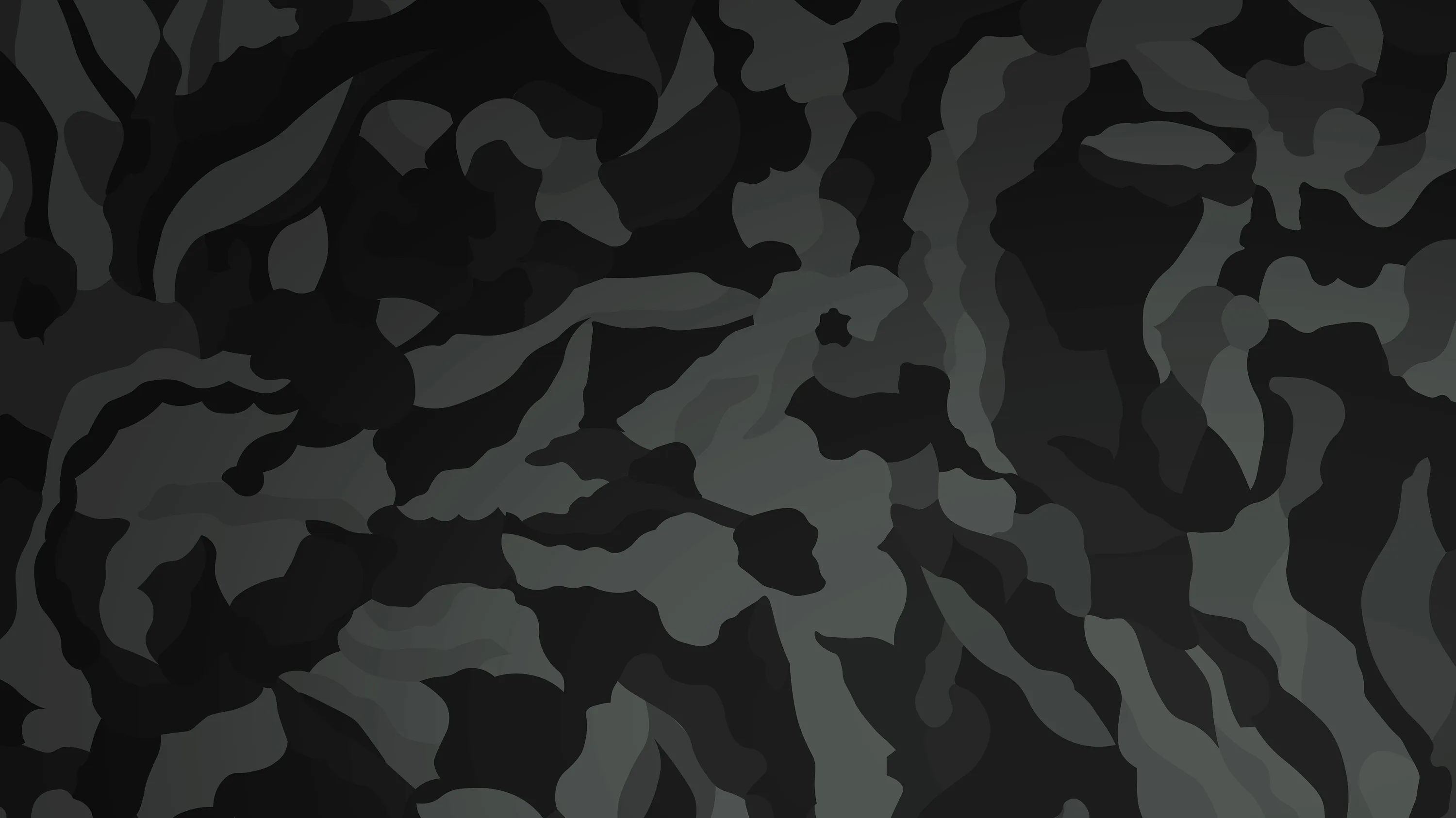 Soft-edged patches of charcoal, grey and black interlock across the whole frame in a flat night camo print.