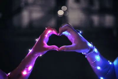 Hands Forming a Heart with Fairy Lights HD Wallpaper