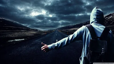 Hitchhiking on an Empty Highway HD Wallpaper