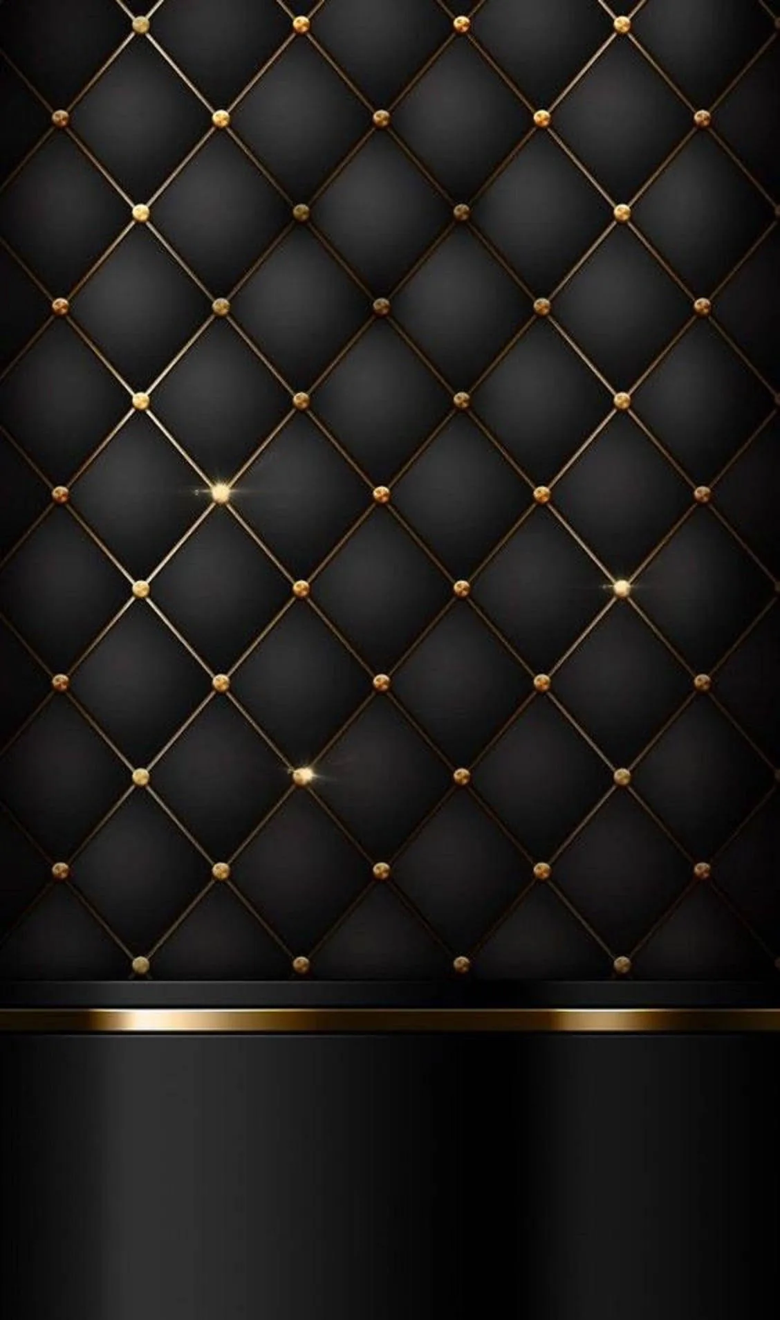 Diamond-tufted black upholstery studded with small brass pins fills most of the tall frame, a single gold stripe crossing above a plain black band at the bottom for the dock.