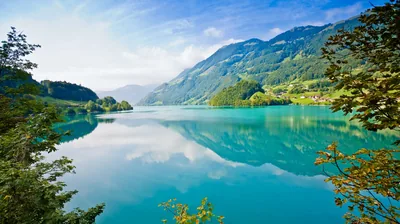 Still Green Water Below Steep Meadows HD Wallpaper