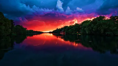 Lightning Storm Over a River at Sunset HD Wallpaper
