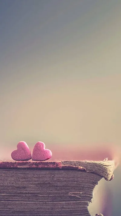 Two Pink Hearts on an Old Book HD Phone Wallpaper