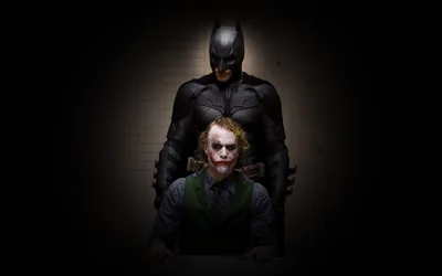 Seated Joker Under Batman's Watch HD Wallpaper