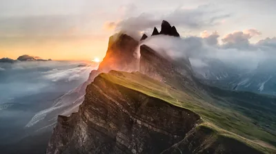 Steep Green Ridge Above the Clouds HD Wallpaper