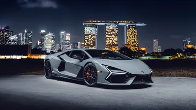 Lamborghini Revuelto with the Singapore Skyline HD Wallpaper