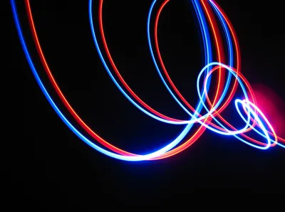 Looping Red and Blue Light Trails HD Wallpaper