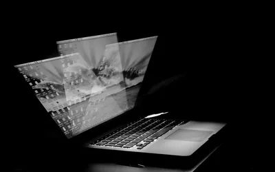 Laptop with Screens Floating Out HD Wallpaper