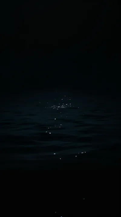 Scattered Lights on Night Water HD Phone Wallpaper