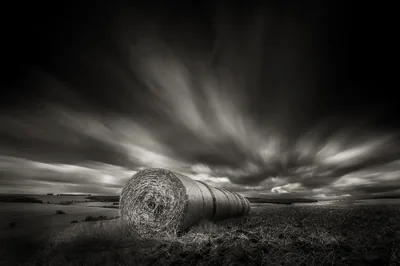 Stormy Skies Over Black & White Hayfield