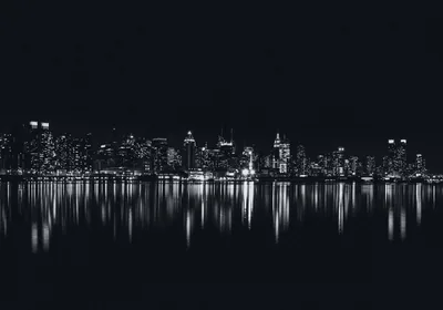 Night Skyline Reflected in Still Water HD Wallpaper