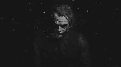 Falling Snow Around a Shadowed Joker HD Wallpaper